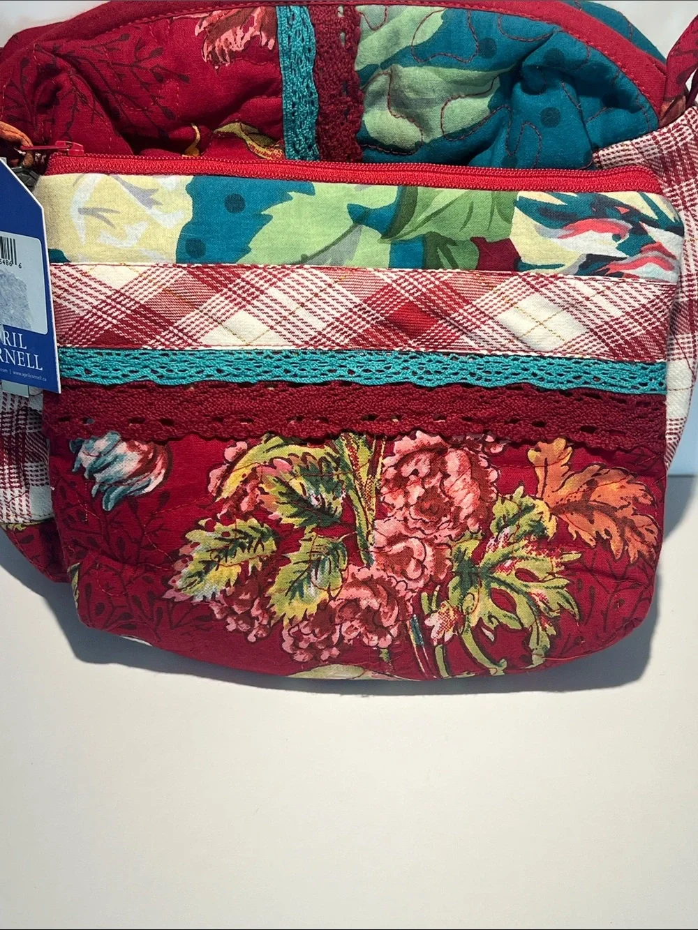 April Cornell Red Floral Quilted Cosmetic Crossbody with Teal Accents